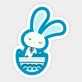 Easter rabbit in a pastel and dark blue egg shell. Sticker